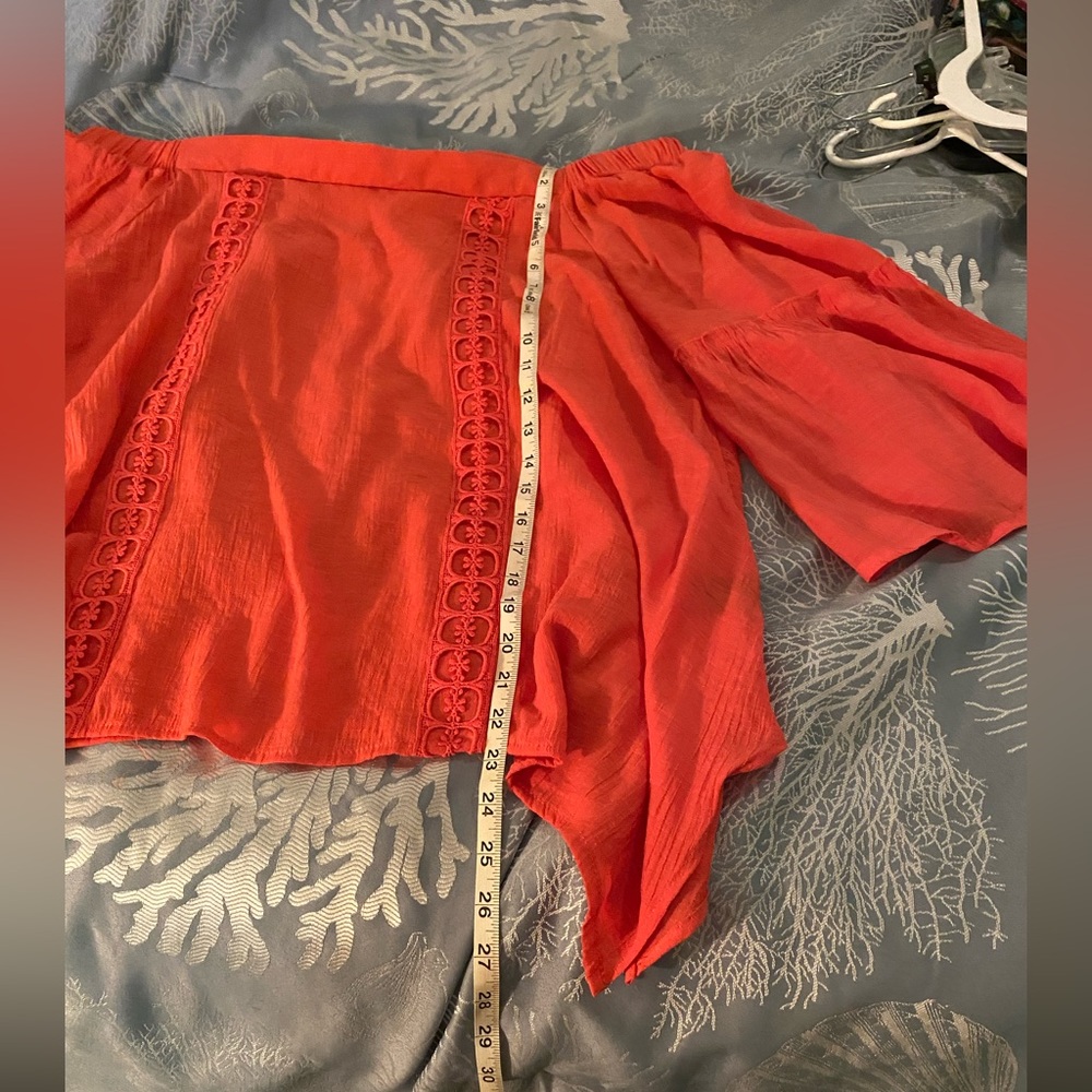 Woman’s off the shoulder shirt in size 3x by Unique Spectrum in a coral color